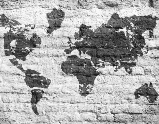 Фотообои Картами мира на фоне кирпичей 22708